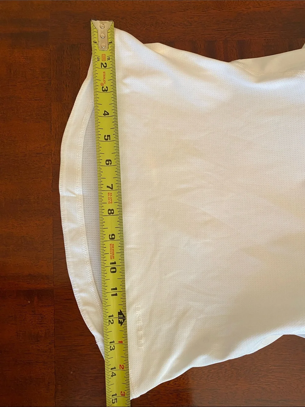 Nike Kids Protective Padded Athletic Shirt in white with Black Pads